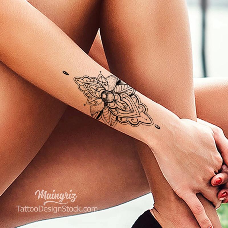 Mandala and flower sleeve tattoo for man - An arm mandala tattoo. This  mandala design is in